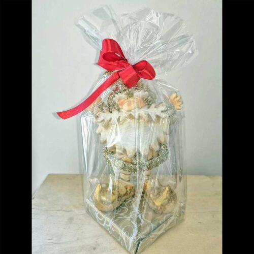 Babbo Natale in ceramica con base di cioccolatini Lindt.